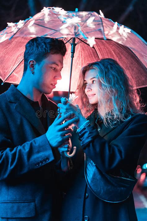 Portrait Of A Guy And A Girl Under An Umbrella Stock Photo Image Of