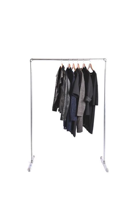 A beautiful clothing rack designed to look like a teepee. These clothes racks are made from 1/2 galvanized pipes ...