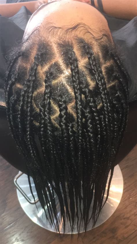 You can still show off your beautiful long braids while adding the extra flair of an updo or high ponytail. Close up of knotless box braids! These are medium size ...