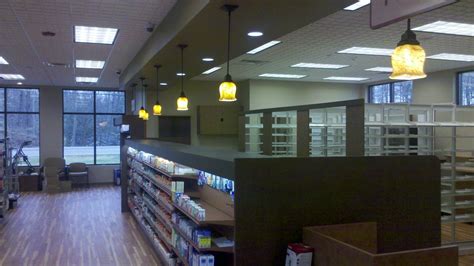The dining room, living room and powder room are also downstairs. Medicine Shoppe Jonesborough TN - RTC General Contractors