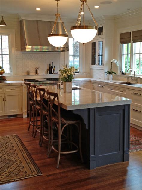 Awesome kitchen islands, some including unique shapes, bar stools, banquettes, decorative posts, and overhead lighting. Kitchen Island Stools - Traditional - kitchen - KItchen Lab