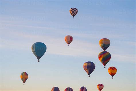 Hot Air Balloons Flying In Sky Stock Photo