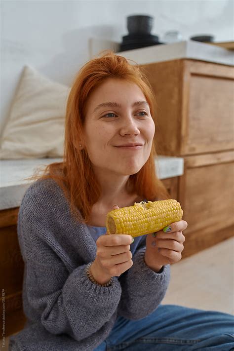 Girl Eats A Vegetable By Stocksy Contributor Tatiana Timofeeva Stocksy