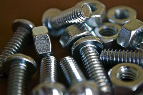 As leading supplier of fastener products in china, our bolts and nuts fastener products export to over 60 countries all over the world. Nuts and Bolts II Photograph by Bill Owen