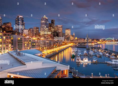Seattle Waterfront At Dusk With The Marina In The Foreground From The