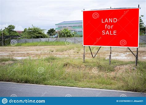 A Sign Advertising Agricultural Land For Industrial Use For Sale Stock