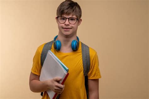 Premium Photo Waist Up Portrait Of A Kid In Eyeglasses Holding