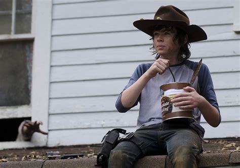 The Walking Dead S4 Ep9 Carl Enjoys A Treat After A Hard Days Work