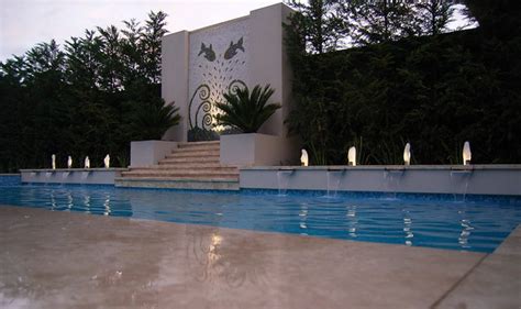 Spillovers like this one from the spa to the main pool can be a great accent. Pool Water Features - Contemporary - Pool - melbourne - by ...