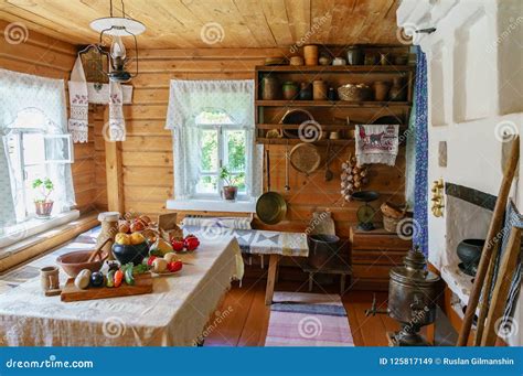 Traditional Russian Cottage With Oven And Crockery Interior Of A