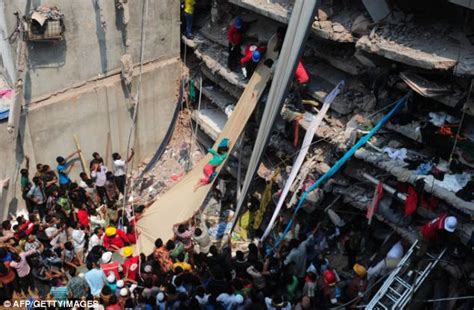 female factory survivor pulled from the rubble four days after bangladesh s worst ever