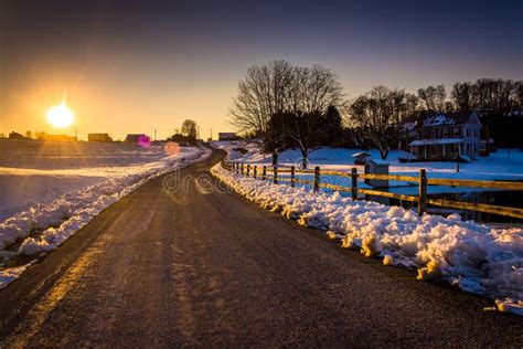 Sunset Over A Country Road During The Winter In Rural York Count Stock