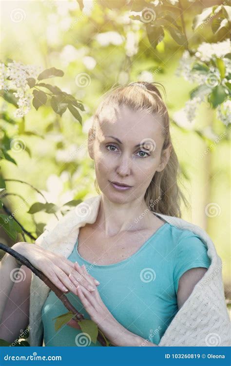 Young Attractive Woman Standing Near The Blossoming Apple Tree Toning Stock Image Image Of