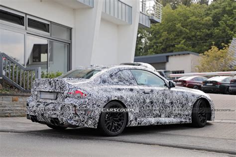 2025 Bmw M2 Cs Spied Out On The Roads Wearing Csl Wheels Carscoops