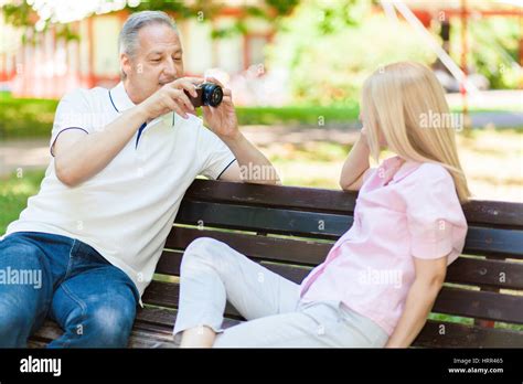 Old Couple Seated In A Bench Hi Res Stock Photography And Images Alamy
