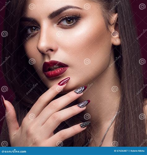 Pretty Girl With Unusual Hairstyle Bright Makeup Red Lips And Manicure Design Beauty Face