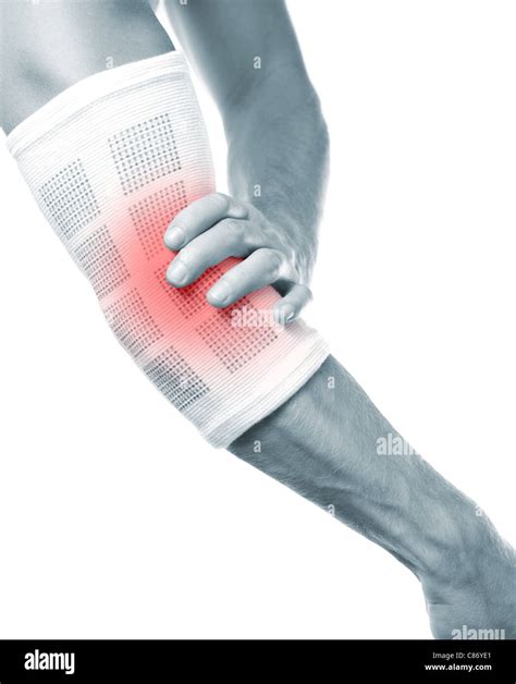 Protecting A Painful Elbow Stock Photo Alamy
