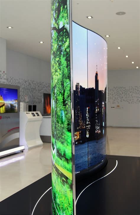 Lg Reveals A 111 Inch Double Sided Wave Shaped Ultra High Res Oled