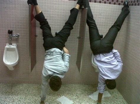 One Hand Stand Urinal Peeing Funny Photos Men Peeing Ballet Shoes Jokes Photos
