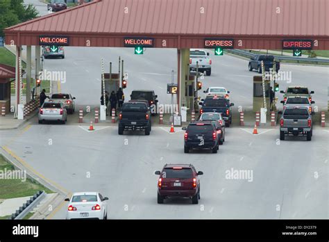 Military Guards Check Vehicles Entering The Front Gate Of Fort Hood