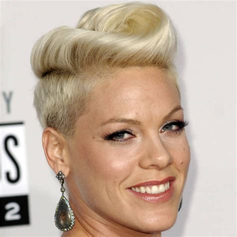 That's an awesome ornamented swirls and cute butterfly on upper breast area. Pink gave up on tattoo removal | Celebrity News | Showbiz ...