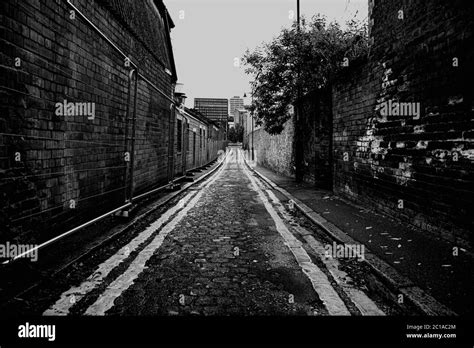 Black And White Narrow Urban Street Stock Photo Alamy