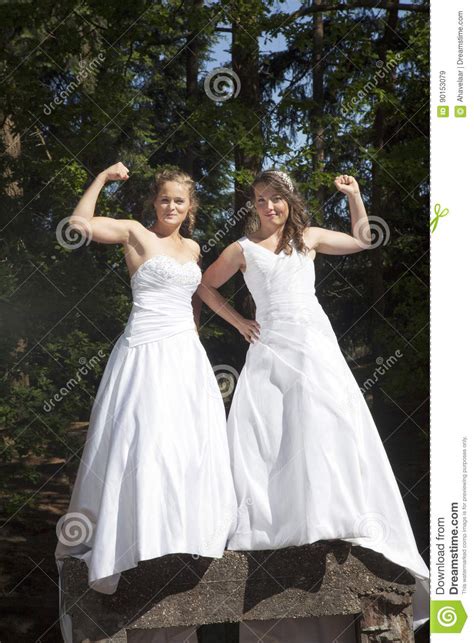 just married happy lesbian couple in white dress close together stock image image of people