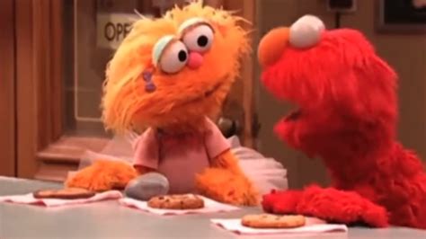Should Elmo Share His Cookie With Rocco Twitter Weighs In Miami Herald