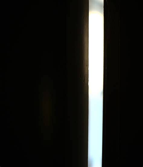 Light Through Narrow Door Opening