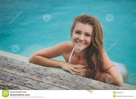 Be one with nature whether you enjoy a cup of coffee, reading a book or just simply enjoying the sunset. Young Female Enjoying Sunny Day On Tropical Beach Stock Photo - Image of people, outdoor: 36435274