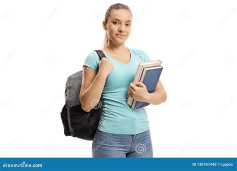 Teenage Schoolgirl With A Backpack Holding Books Stock Photo Image Of
