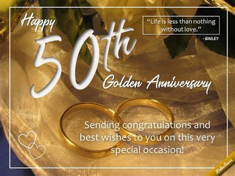 An Anniversary Card With Two Gold Wedding Rings