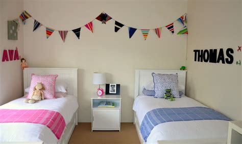 Modern farmhouse boy bedroomm decor with iron bed and neutral kid bedding. Style a Kids' Shared Bedroom - Stuff Mums Like