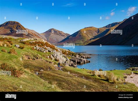 The Beautiful Calm Waters Of Wast Water On A Bright Sunny Day At The