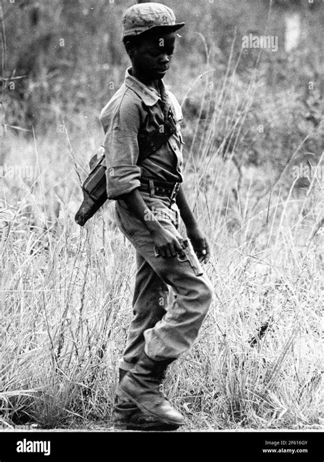 Angola 1970 Angolan War Of Independence With A Gun In His Hand And The Rifle On His Back One