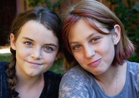 Close Up Of Two Smiling Tween Girl Friends By Stocksy Contributor Tanya Constantine Stocksy