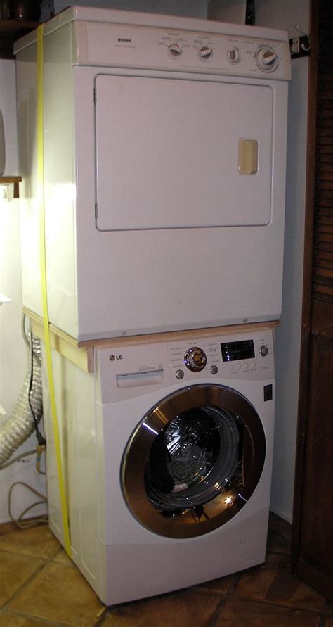 Stack Washer And A Dryer Small Laundry Room Organization Laundry Room Storage Shelves