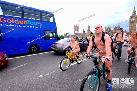 World Naked Bike Ride In London Crossing The Westminster Bridge
