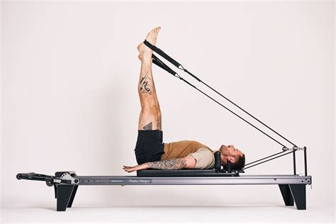 Reformer Pilates Explained How It Can Work For You Pilates Reformer