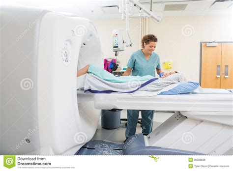 Nurse Looking At Patient Undergoing Ct Scan Test Stock Photo Image Of