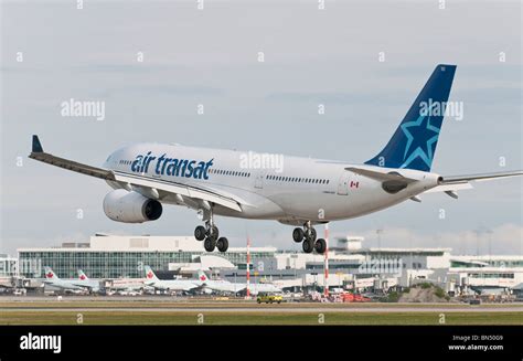 An Air Transat Airbus A330 Jet Airliner Landing At Vancouver