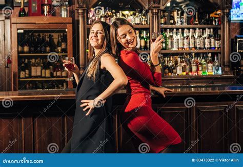 Two Beautiful Women Having Fun At The Bar Stock Photo Image Of Lifestyle Glass