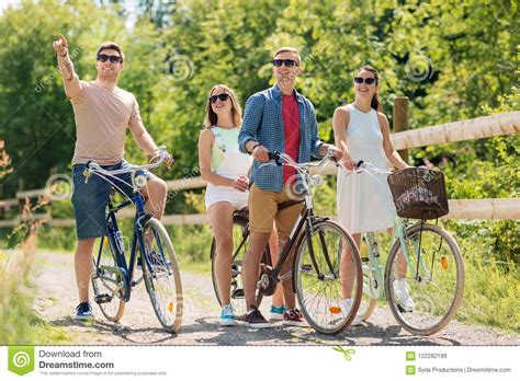 Happy Friends Riding Fixed Gear Bicycles In Summer Stock Image Image