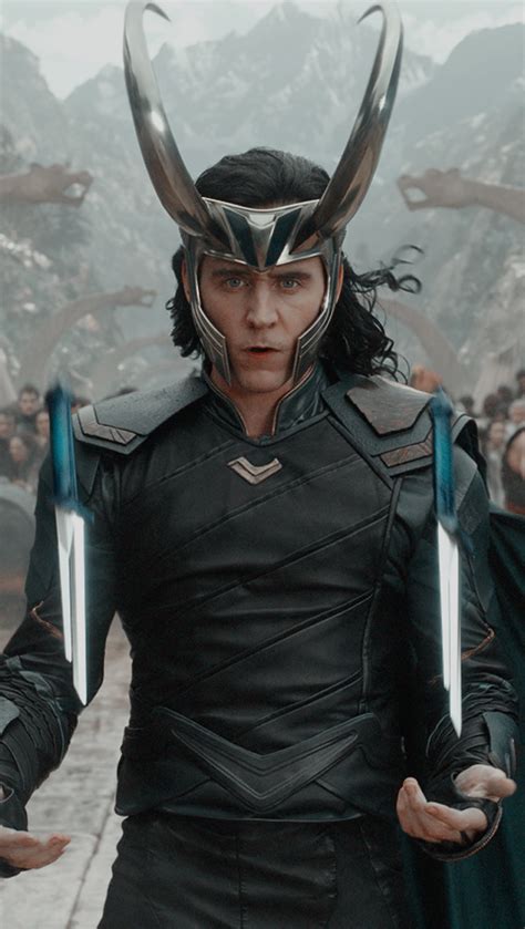 Loki In The Avengers Movie With Horns On His Head And Two Hands Out