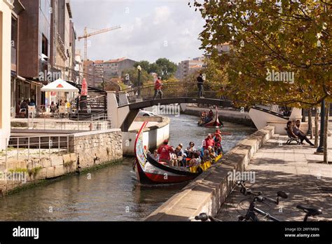 Aveiro's picturesque allure: Colorful canals, timeless azulejos, and