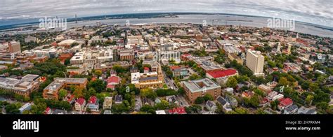 Panoramic Aerial View Of Charleston With Dense Buildings Under A Cloudy