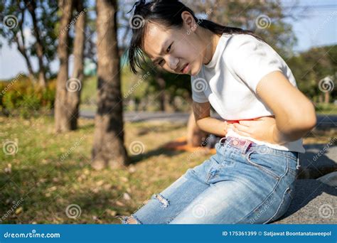 Asian Woman With Stomachache Teenage Girl Having Aching Belly With Chronic Abdominal Pain Period