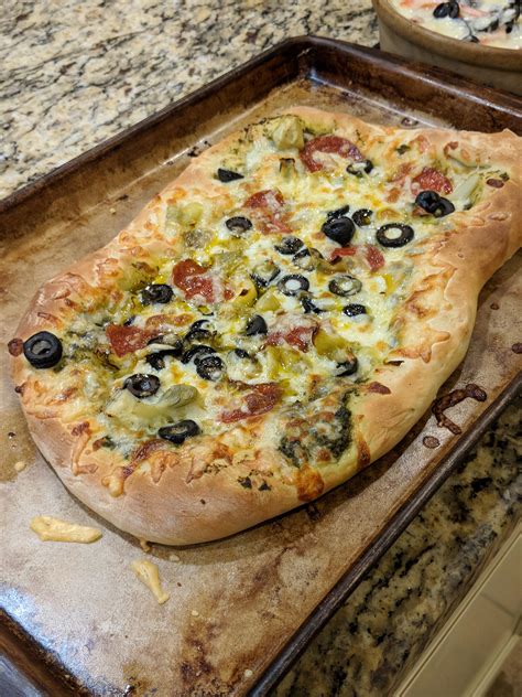 Homemade Pesto Pizza With Pepperoni Olives And Artichoke Rfood