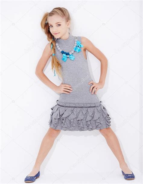 Cute Little Girl In A Dress Posing — Stock Photo © Fxquadro 71293467