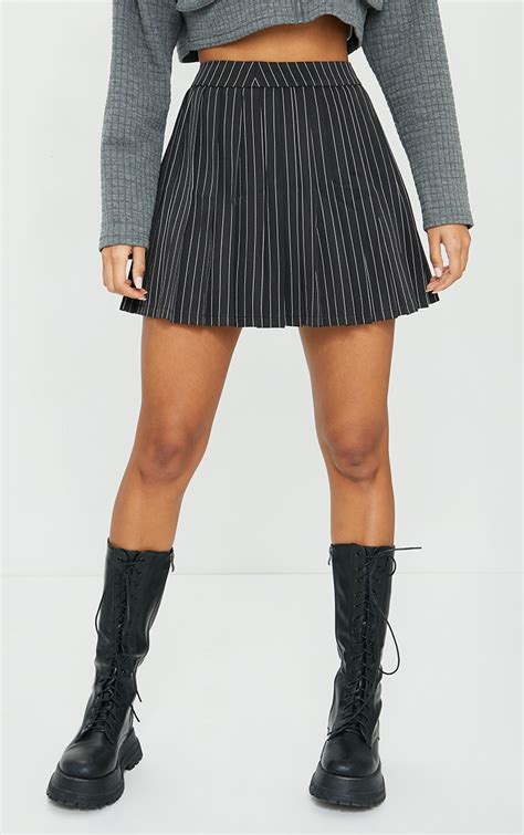 Black Pinstripe Woven Pleated Tennis Skirt Prettylittlething Usa